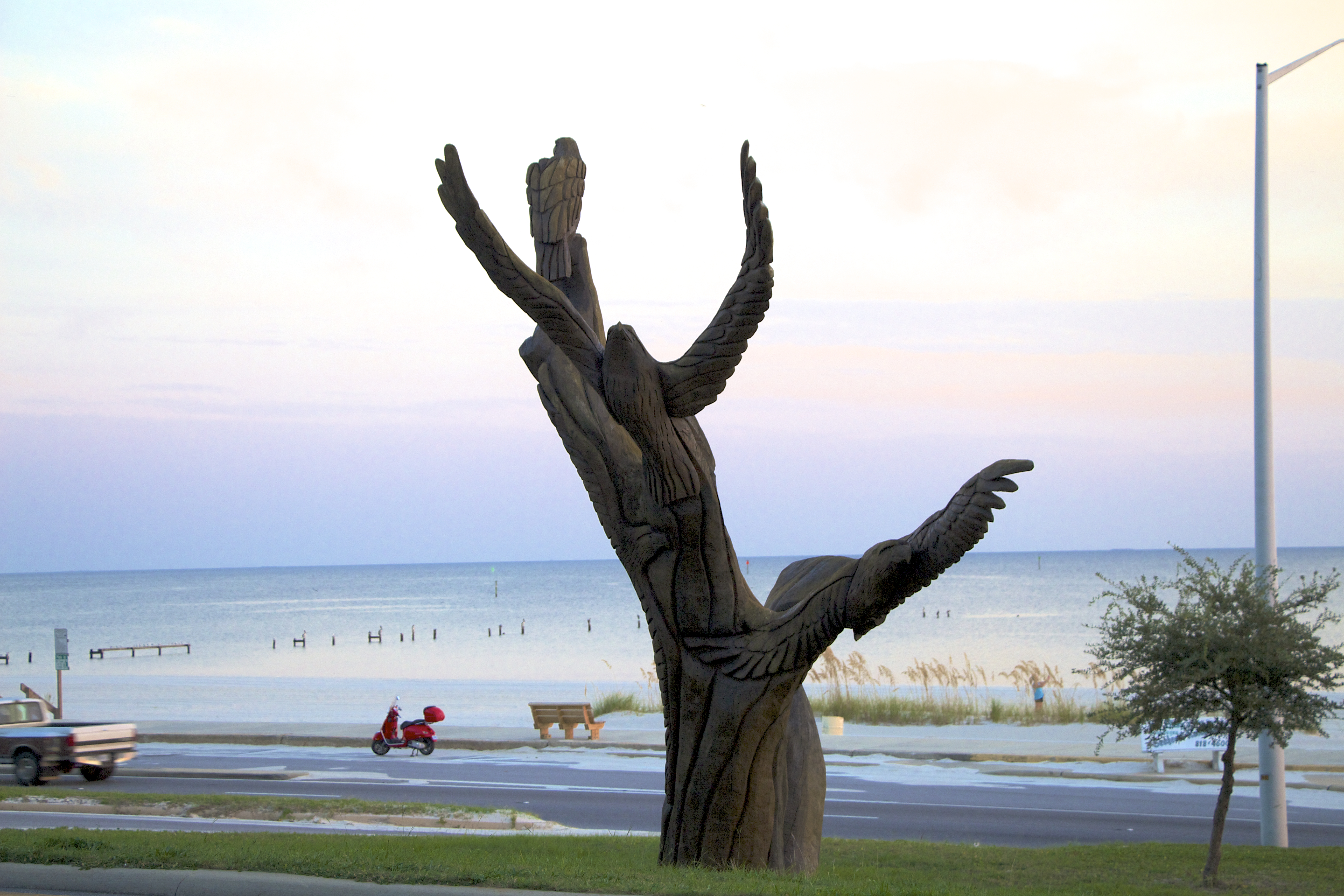 Hand carved tree trunks made from the few Live Oaks that survived Hurricane Katrina. Artists donated their chainsaw sculpting.